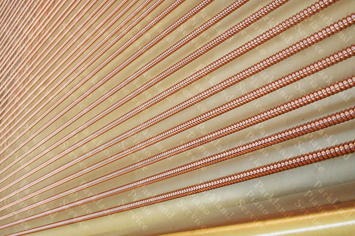 Newly installed piano bass strings